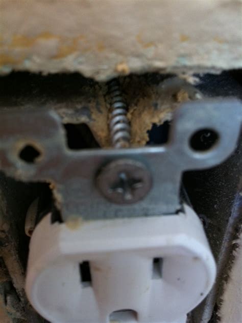 ceiling electrical box screw hole stripped|broken electrical outlet box.